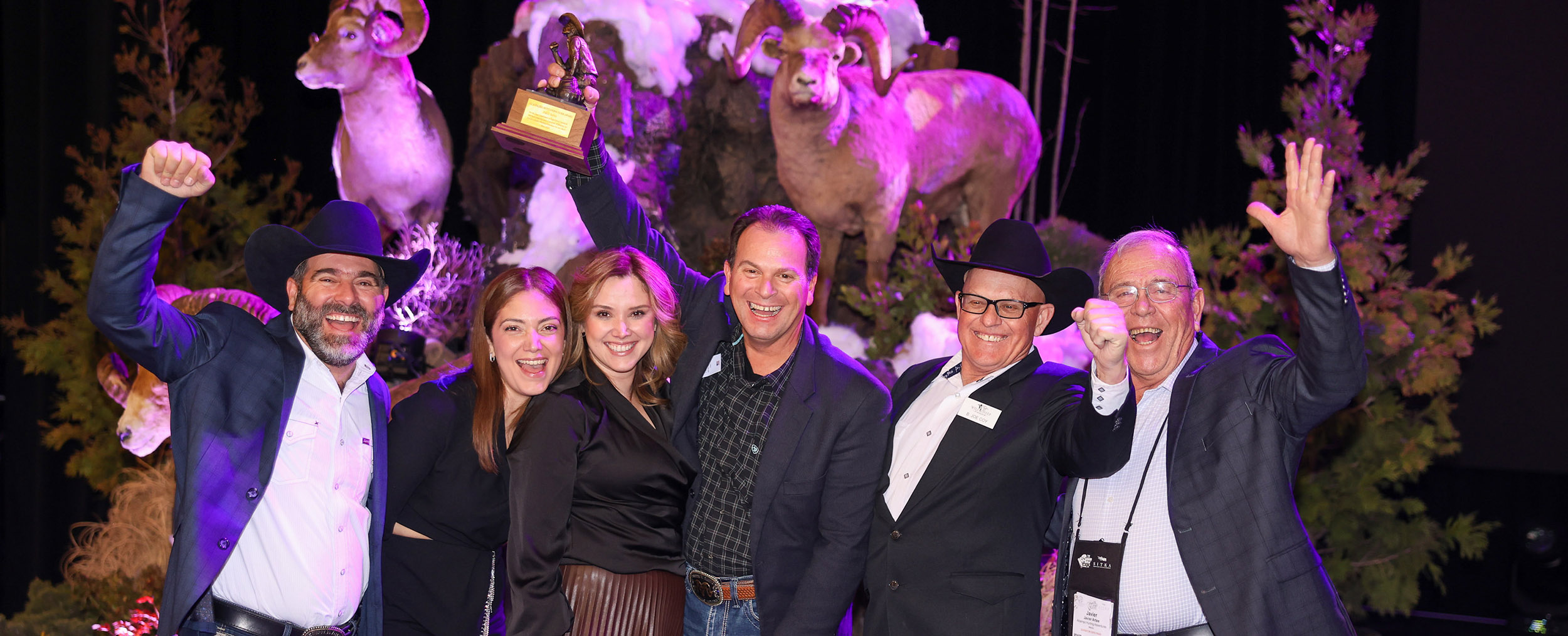Jorge Artee with his friends and his family on stage during the 2025 Sheep Show